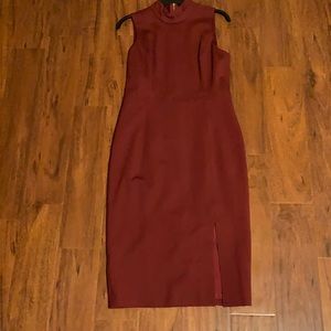 Dark red dress. With leg slit. Super good material. Calf length.